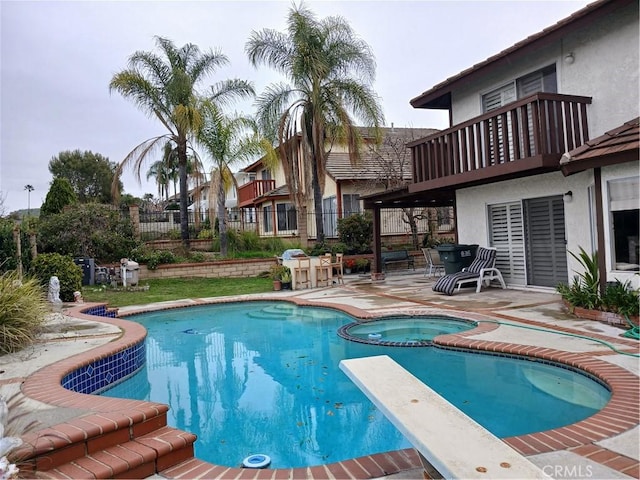 11537 Moonridge Dr, Whittier, CA 90601 - view of swimming pool featuring a patio, a pool with connected hot tub, and a diving board