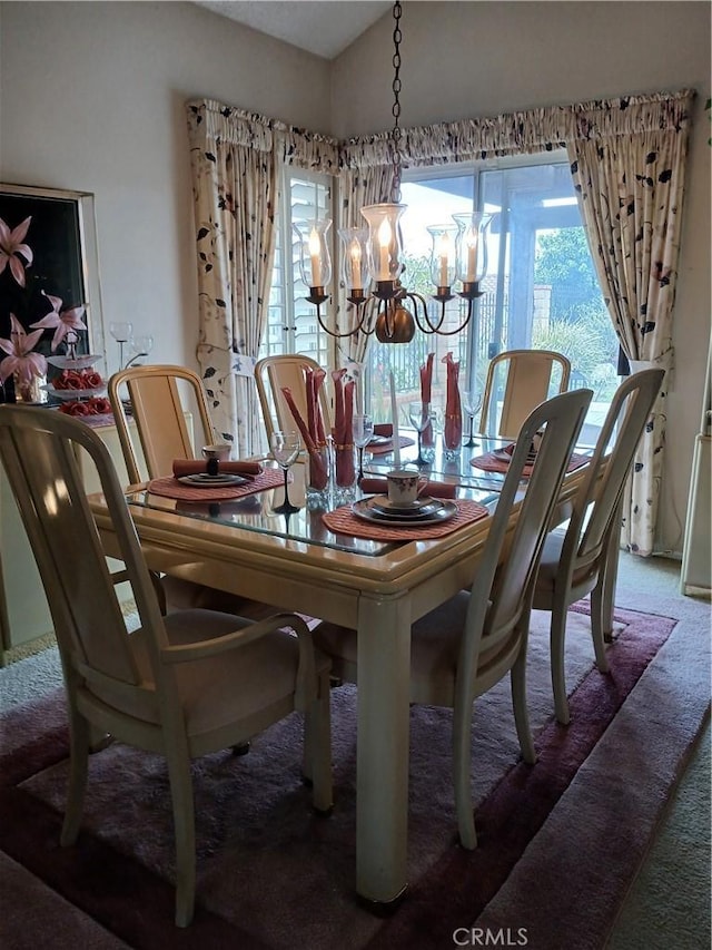 11537 Moonridge Dr, Whittier, CA 90601 - dining space featuring a chandelier and carpet flooring