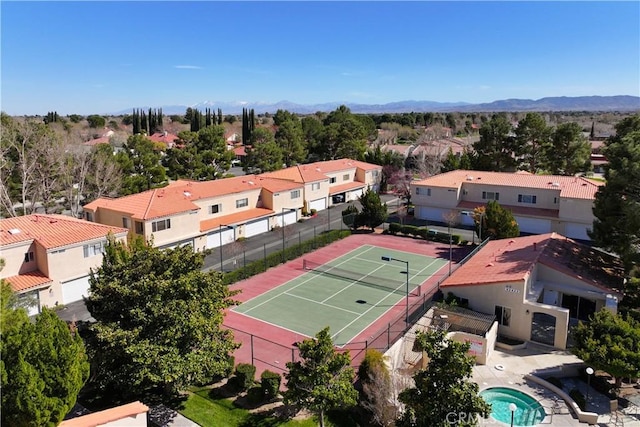 aerial view featuring a mountain view and a residential view