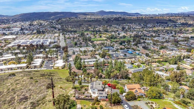 birds eye view of property featuring a residential view and a mountain view