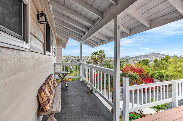 balcony featuring a mountain view