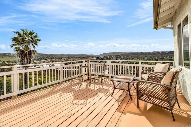 deck with a mountain view