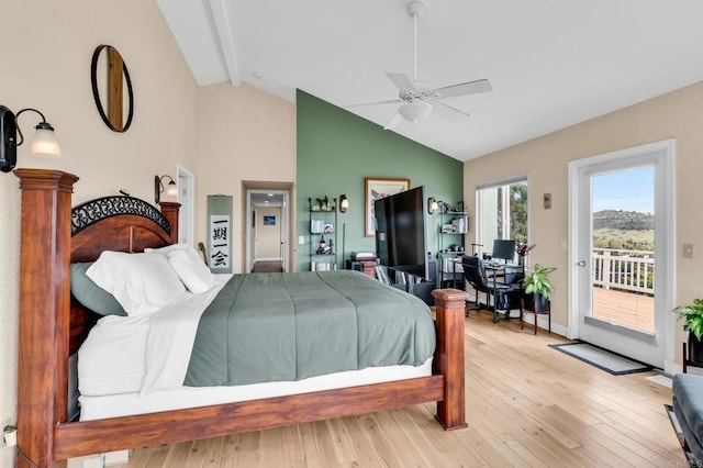 bedroom with access to exterior, a ceiling fan, light wood-style floors, beam ceiling, and high vaulted ceiling