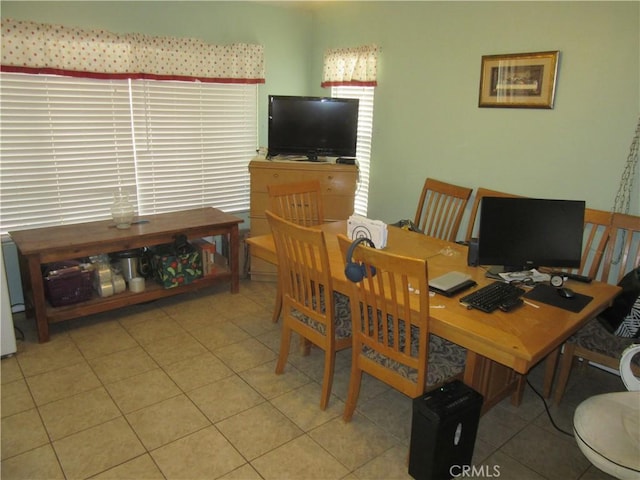 dining area with light tile patterned floors