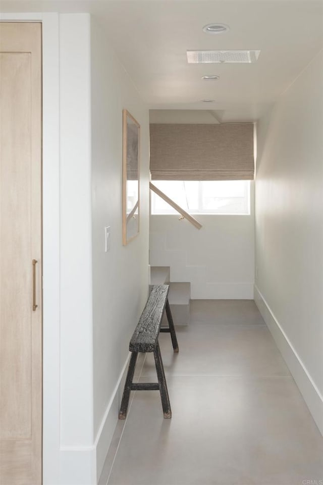 164 Chestnut Ave, Carlsbad, CA 92008 - corridor with concrete flooring and baseboards