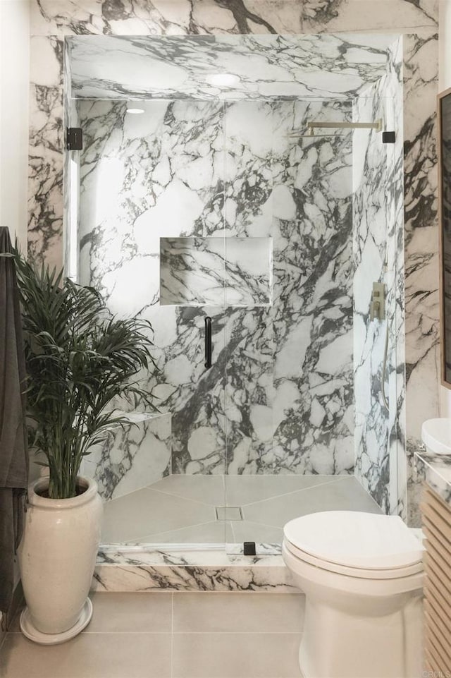 164 Chestnut Ave, Carlsbad, CA 92008 - bathroom with toilet, a marble finish shower, tile patterned flooring, and vanity