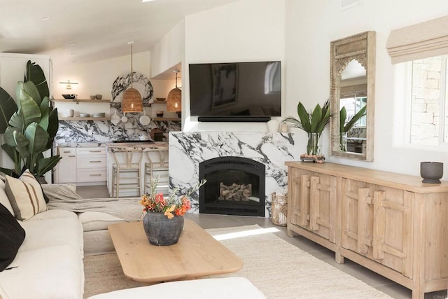 164 Chestnut Ave, Carlsbad, CA 92008 - living area featuring a fireplace, light tile patterned floors, and lofted ceiling
