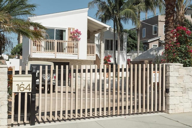164 Chestnut Ave, Carlsbad, CA 92008 - view of front of property with stucco siding and a gate