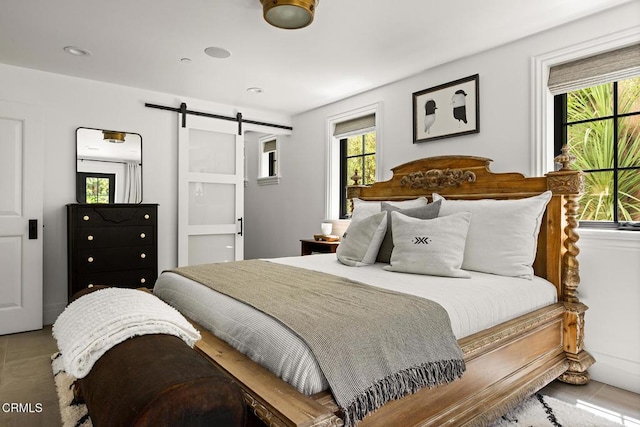 bedroom with a barn door