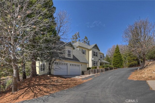 27601 Cedarwood Dr, Lake Arrowhead, CA 92352 - exterior space featuring a shingled roof