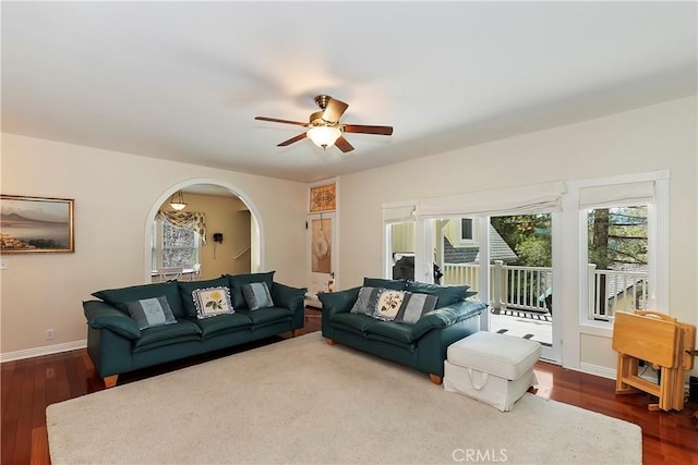 27601 Cedarwood Dr, Lake Arrowhead, CA 92352 - living area featuring a ceiling fan, a wealth of natural light, and dark wood-type flooring