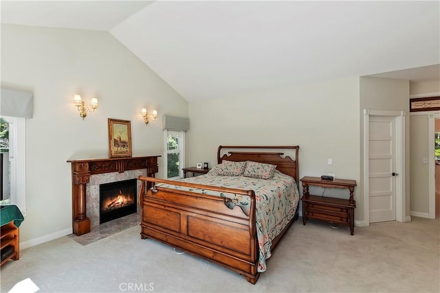 27601 Cedarwood Dr, Lake Arrowhead, CA 92352 - bedroom with baseboards, a high end fireplace, high vaulted ceiling, and carpet floors
