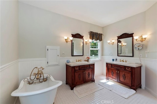 27601 Cedarwood Dr, Lake Arrowhead, CA 92352 - bathroom with a wainscoted wall, two vanities, and a sink