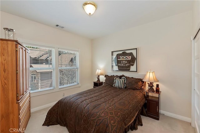 27601 Cedarwood Dr, Lake Arrowhead, CA 92352 - bedroom featuring light carpet, baseboards, and visible vents