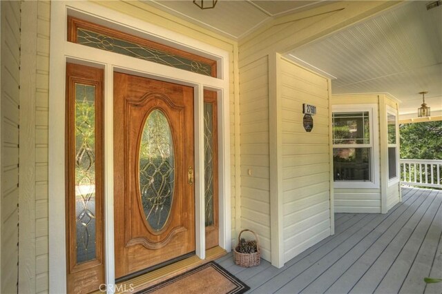 27601 Cedarwood Dr, Lake Arrowhead, CA 92352 - view of exterior entry with covered porch