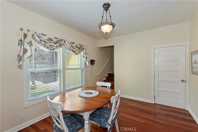 27601 Cedarwood Dr, Lake Arrowhead, CA 92352 - dining room featuring plenty of natural light, wood finished floors, baseboards, and stairs
