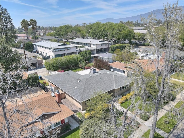 birds eye view of property with a residential view and a mountain view