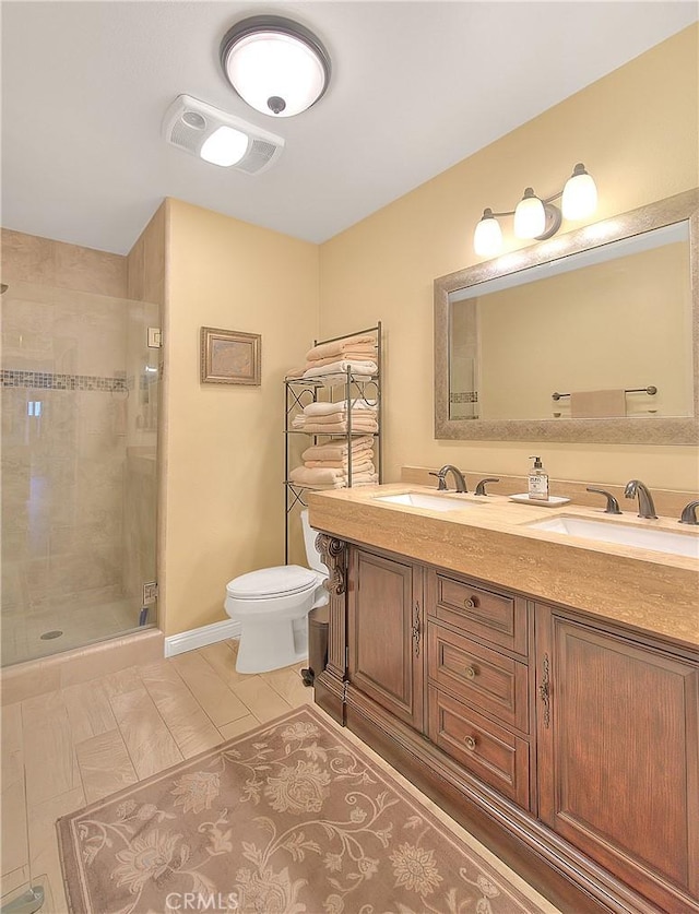 full bathroom with visible vents, double vanity, toilet, a sink, and a stall shower