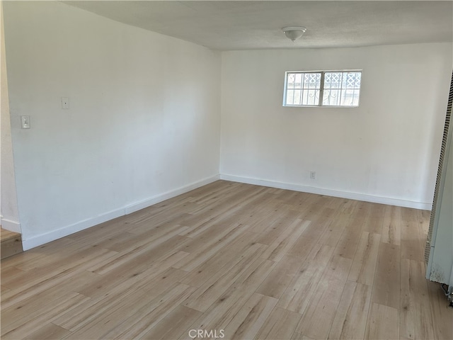 3391 Scarboro St, Los Angeles, CA 90065 - spare room featuring light wood-style flooring and baseboards