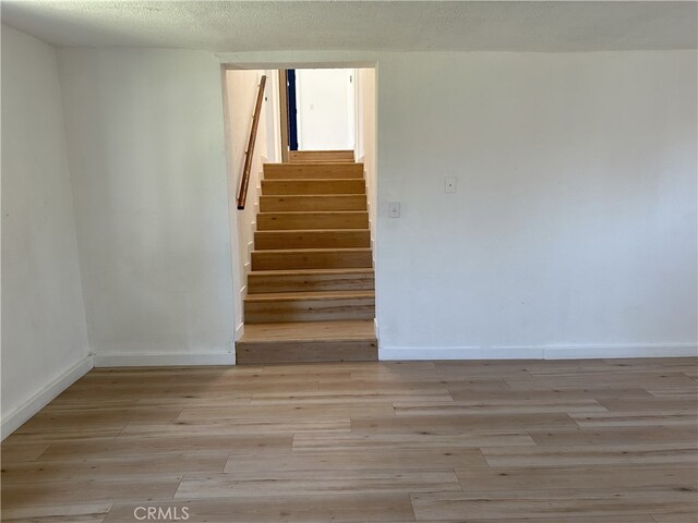 3391 Scarboro St, Los Angeles, CA 90065 - stairway featuring wood finished floors and baseboards