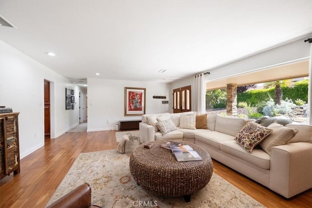 1040 Par Ave, Paso Robles, CA 93446 - living area with wood finished floors, recessed lighting, and baseboards