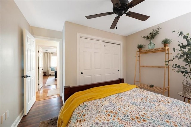 1040 Par Ave, Paso Robles, CA 93446 - bedroom featuring dark wood finished floors, a closet, baseboards, and a ceiling fan