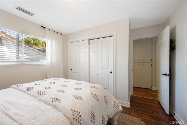 1040 Par Ave, Paso Robles, CA 93446 - bedroom featuring dark wood finished floors, a closet, and baseboards