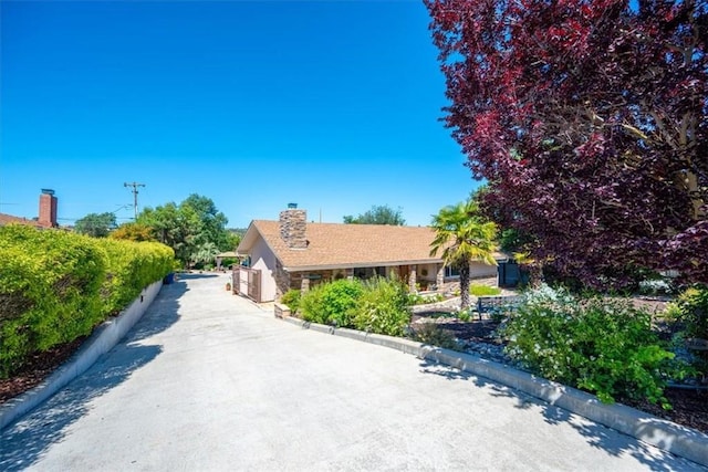 1040 Par Ave, Paso Robles, CA 93446 - view of front of property featuring stone siding and a chimney