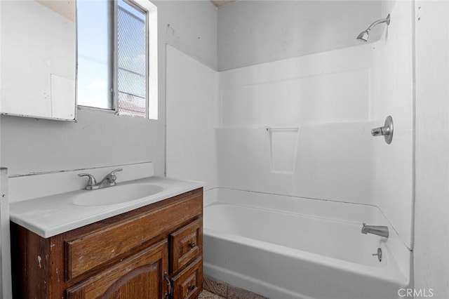 bathroom with bathing tub / shower combination and vanity