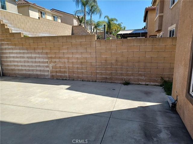 view of patio with fence