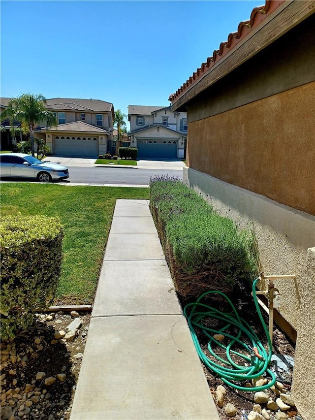 view of yard with a residential view