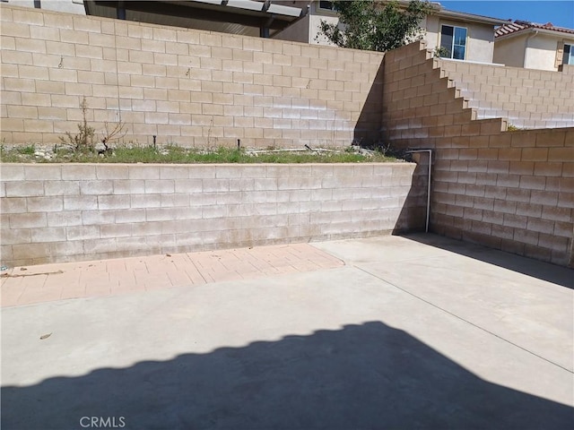 view of patio / terrace with fence