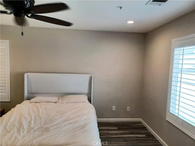bedroom with visible vents, baseboards, ceiling fan, recessed lighting, and dark wood-style floors