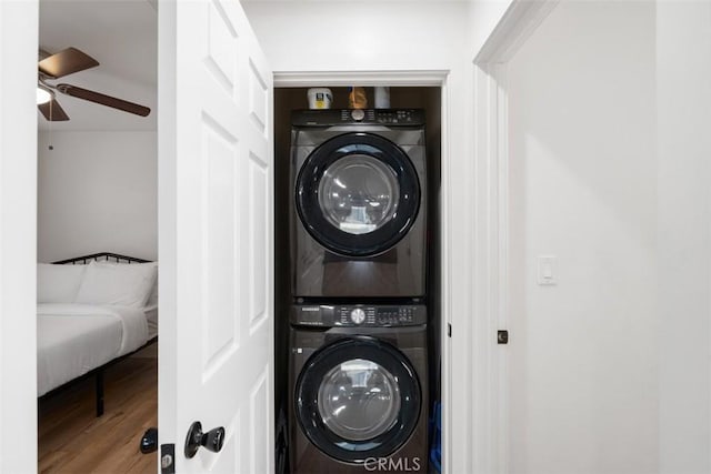 1727 W 59th Pl, Los Angeles, CA 90047 - washroom featuring stacked washer and clothes dryer, a ceiling fan, and wood finished floors