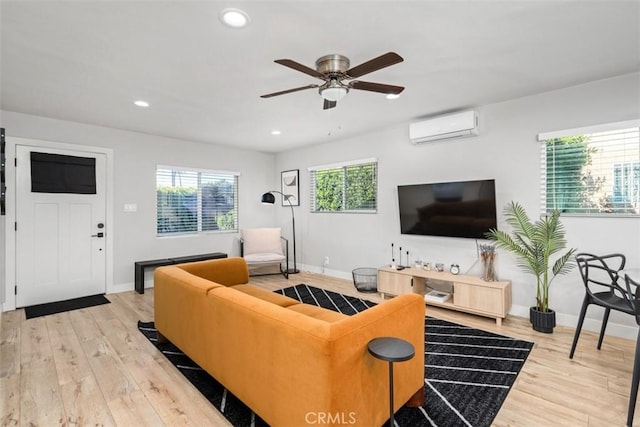 1727 W 59th Pl, Los Angeles, CA 90047 - living room with a wall unit AC, wood finished floors, recessed lighting, and a ceiling fan