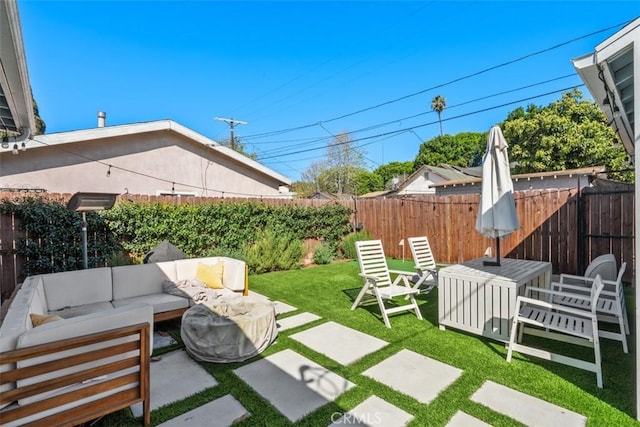 1727 W 59th Pl, Los Angeles, CA 90047 - fenced backyard featuring an outdoor living space and a patio