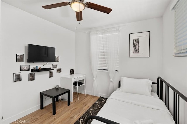 1727 W 59th Pl, Los Angeles, CA 90047 - bedroom with light wood-type flooring and ceiling fan