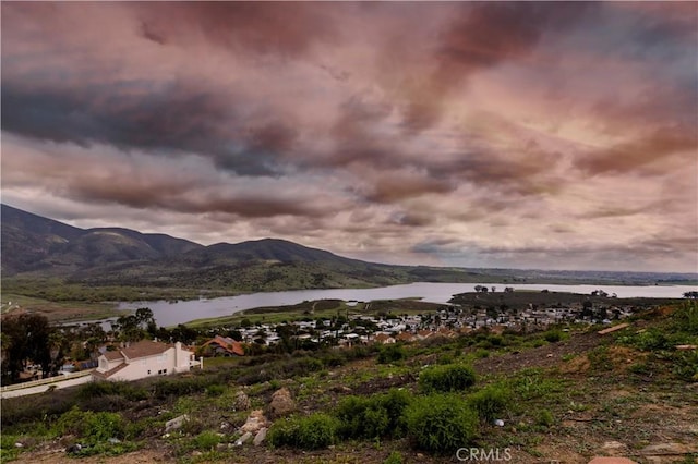 mountain view with a water view