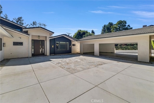 14084 Bronte Dr, Whittier, CA 90602 - view of front of home featuring a tile roof, stucco siding, and a patio