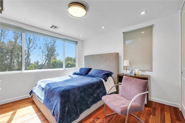 14084 Bronte Dr, Whittier, CA 90602 - bedroom with wood finished floors, recessed lighting, baseboards, and visible vents