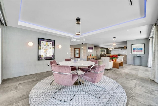 14084 Bronte Dr, Whittier, CA 90602 - dining area featuring visible vents and a raised ceiling