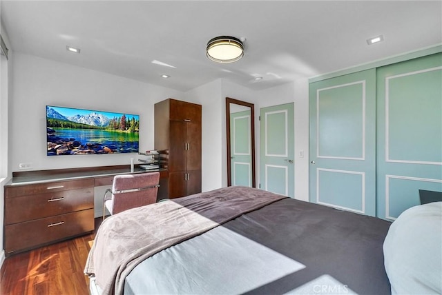14084 Bronte Dr, Whittier, CA 90602 - bedroom with dark wood-style flooring and a closet