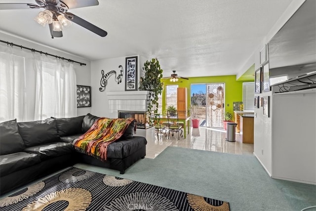 19189 San Jacinto Way, Apple Valley, CA 92308 - living room with a ceiling fan and a tiled fireplace