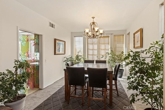 19189 San Jacinto Way, Apple Valley, CA 92308 - dining room featuring dark colored carpet, visible vents, and a notable chandelier