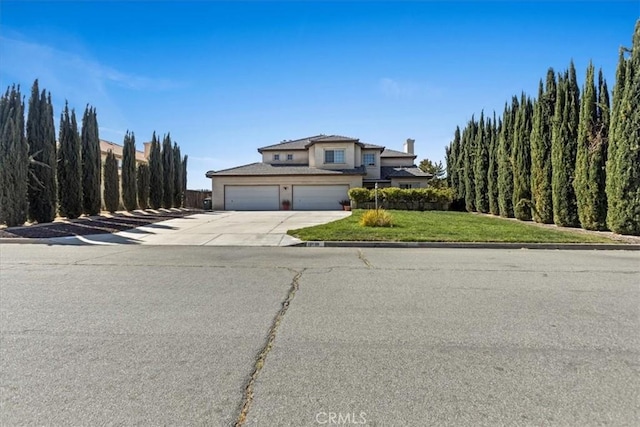 19189 San Jacinto Way, Apple Valley, CA 92308 - traditional home featuring a front yard, a garage, and driveway