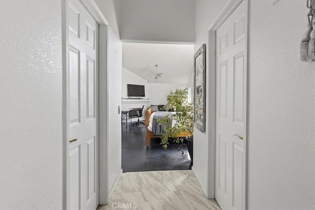 19189 San Jacinto Way, Apple Valley, CA 92308 - hall with baseboards, marble finish floor, and vaulted ceiling