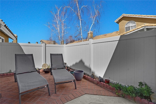 view of patio with fence