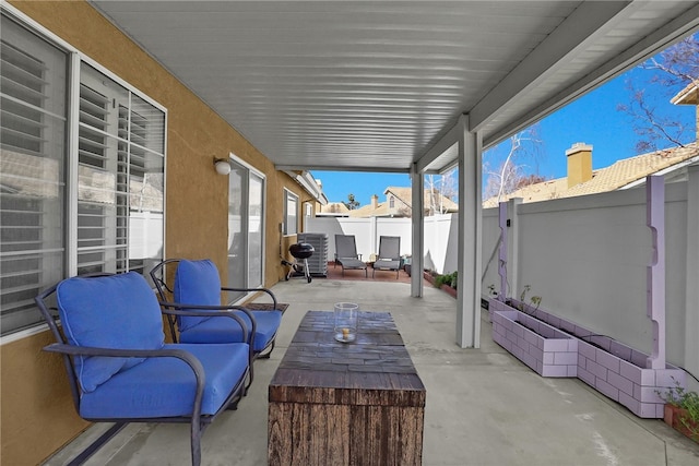 view of patio featuring cooling unit and a fenced backyard