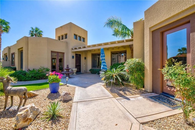 9 Via Haciendas, Rancho Mirage, CA 92270 - view of front of house featuring stucco siding