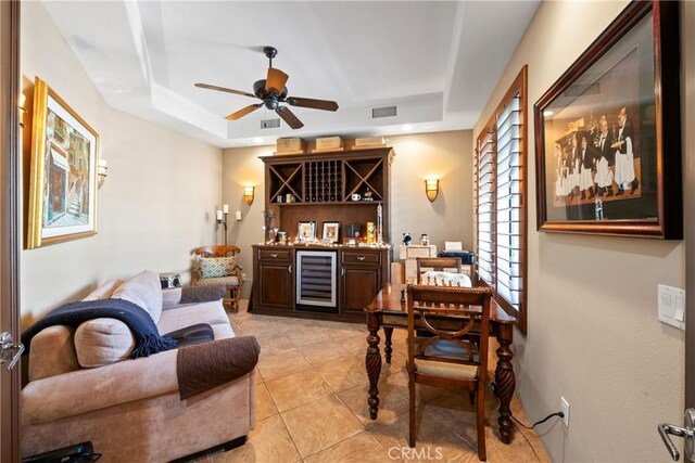 9 Via Haciendas, Rancho Mirage, CA 92270 - interior space with ceiling fan, a dry bar, light tile patterned flooring, a raised ceiling, and wine cooler